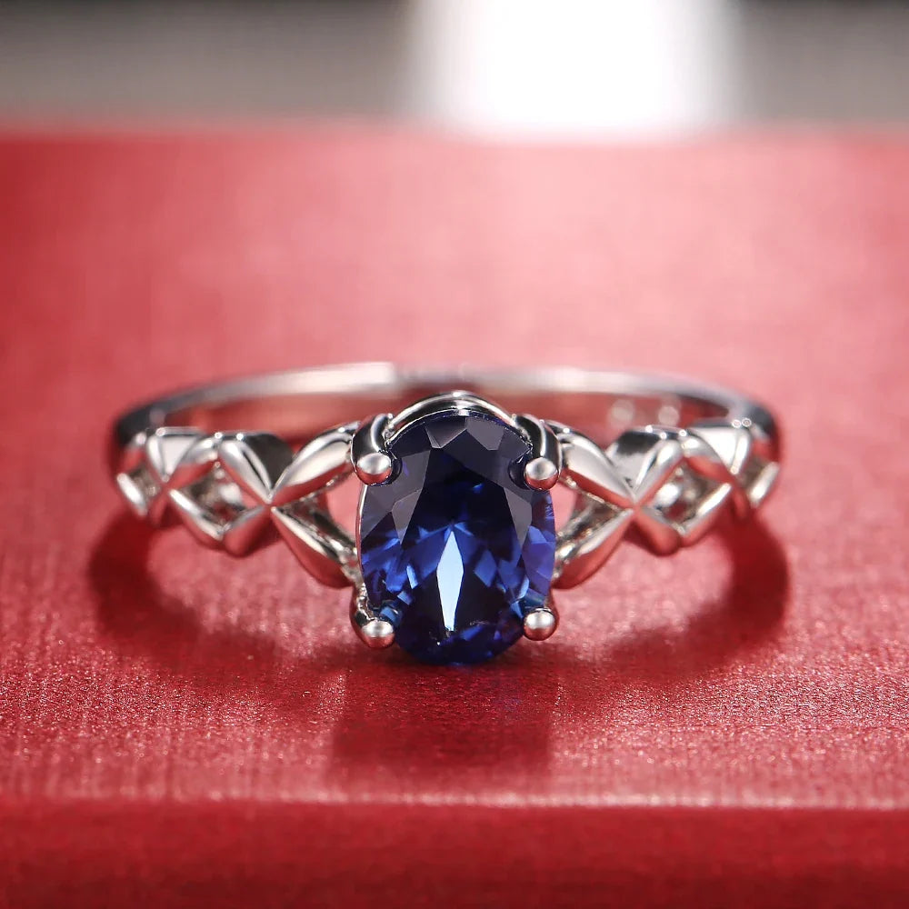Huitan Deep Blue Zirconia Women's Ring – 4-Prong Classic Band