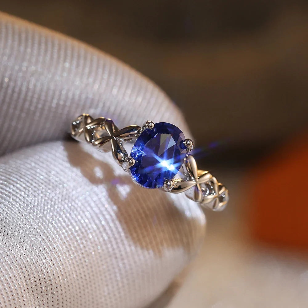 Huitan Deep Blue Zirconia Women's Ring – 4-Prong Classic Band