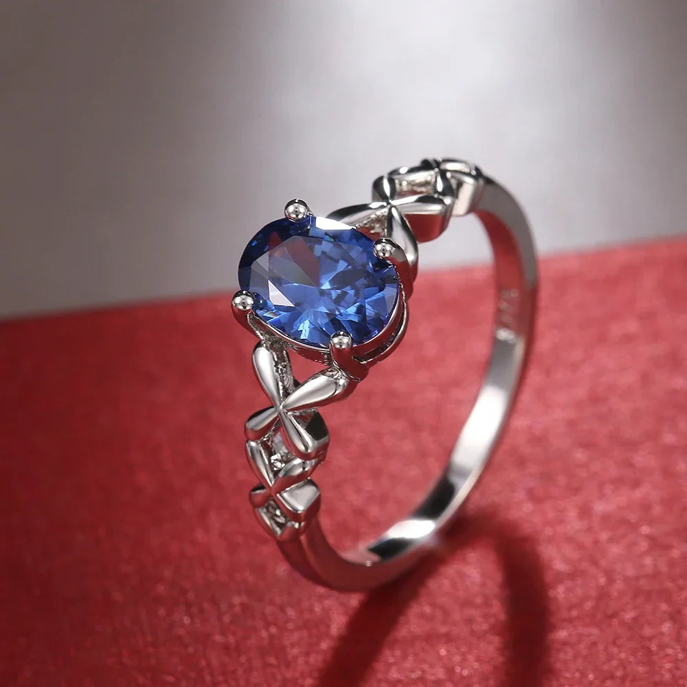 Huitan Deep Blue Zirconia Women's Ring – 4-Prong Classic Band
