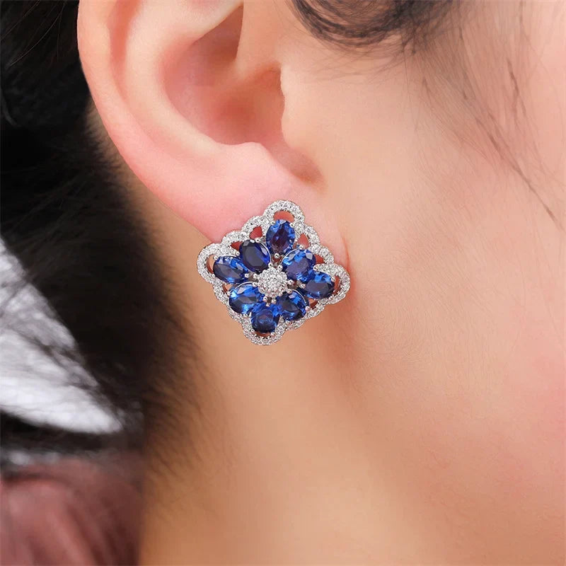 Huitan Silver Cubic Zirconia Stud Earrings – White & Blue CZ