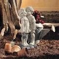 Kids Sharing a Kiss Bench Sculpture – Resin Garden Figurine