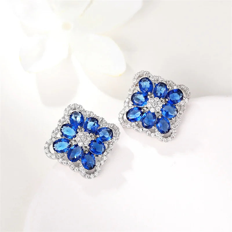 Huitan Silver Cubic Zirconia Stud Earrings – White & Blue CZ