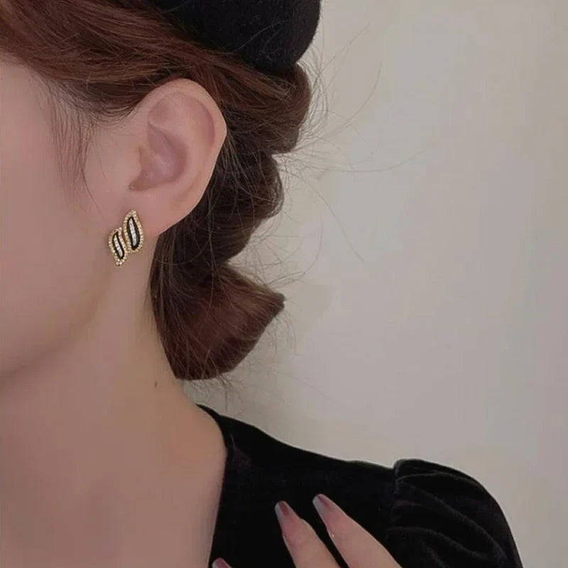 Huitan Double Leaf Gold Stud Earrings – Cubic Zirconia