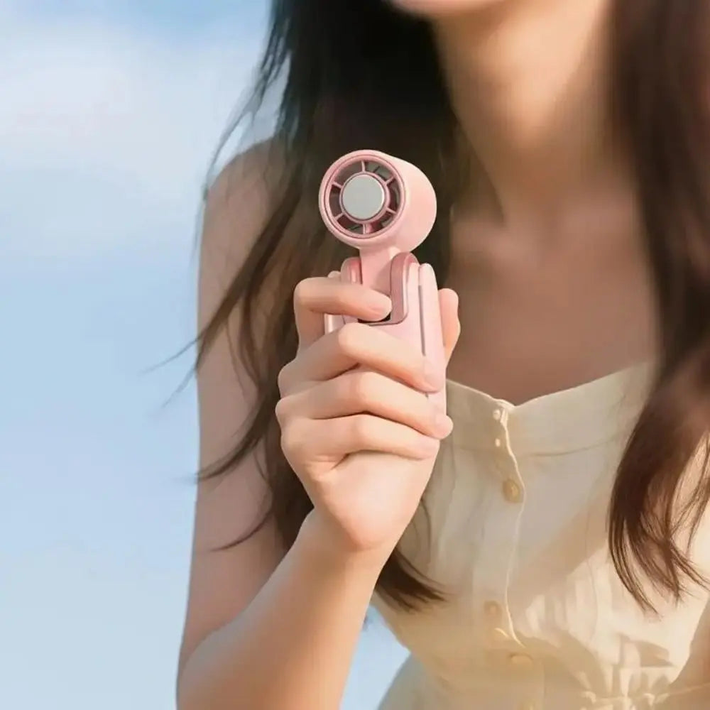 Compact Handheld Cooling Fan – USB Rechargeable Portable