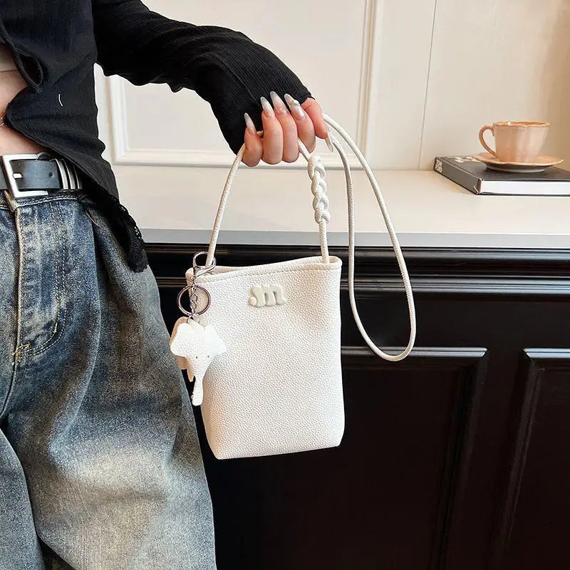 Women's Mini PU Leather Crossbody Phone Bag with Ball Pendant