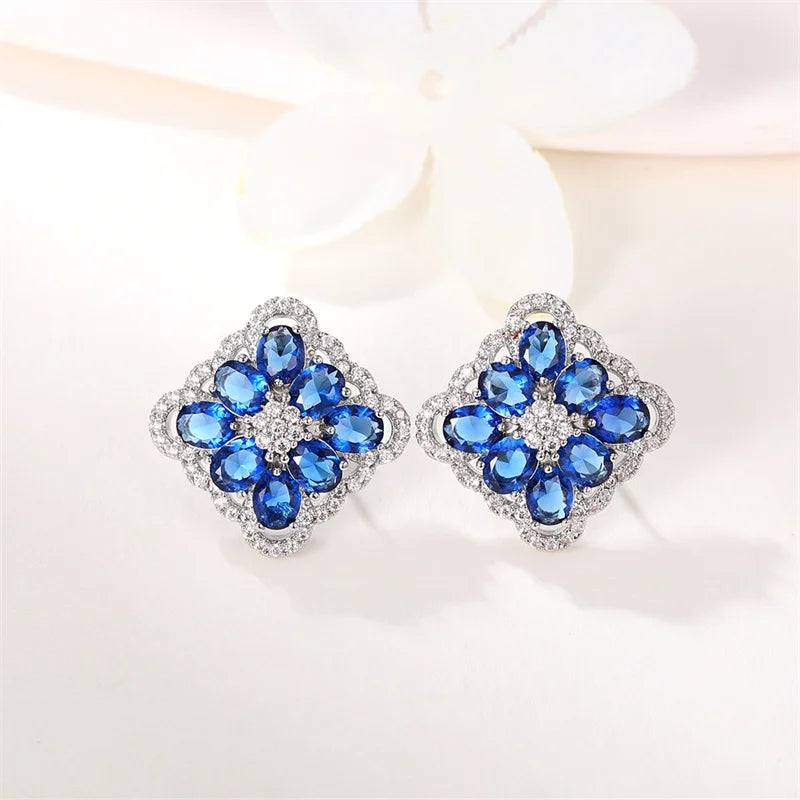 Huitan Silver Cubic Zirconia Stud Earrings – White & Blue CZ