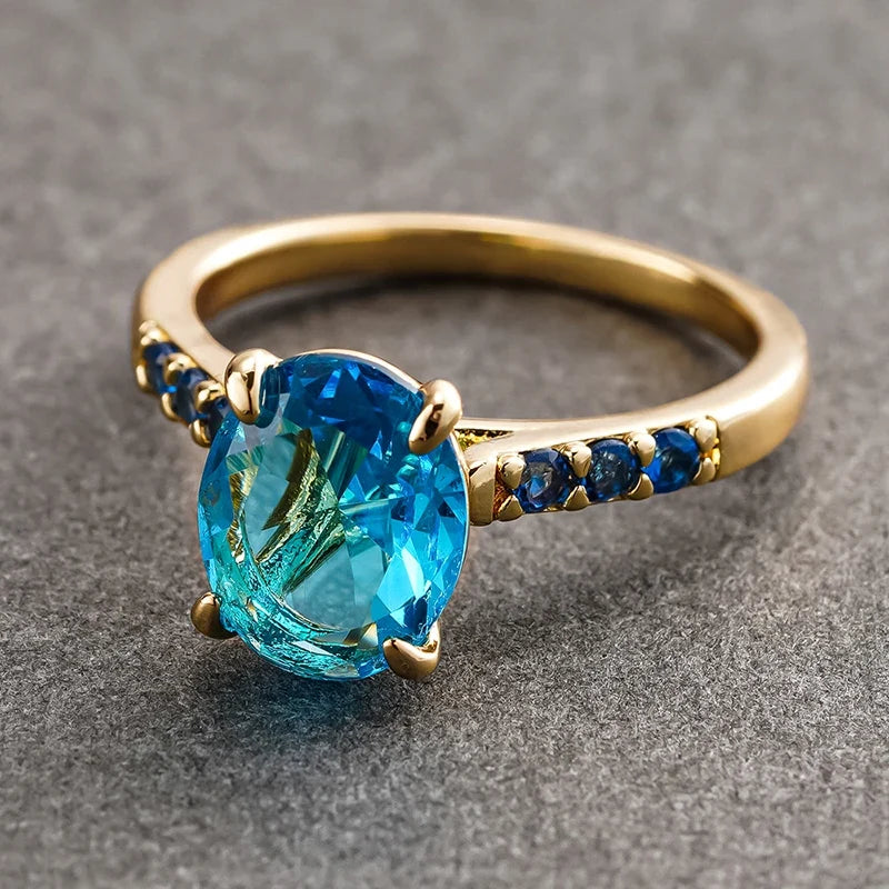 Huitan Sky Blue CZ Oval Ring – Gold Women's Wedding Band