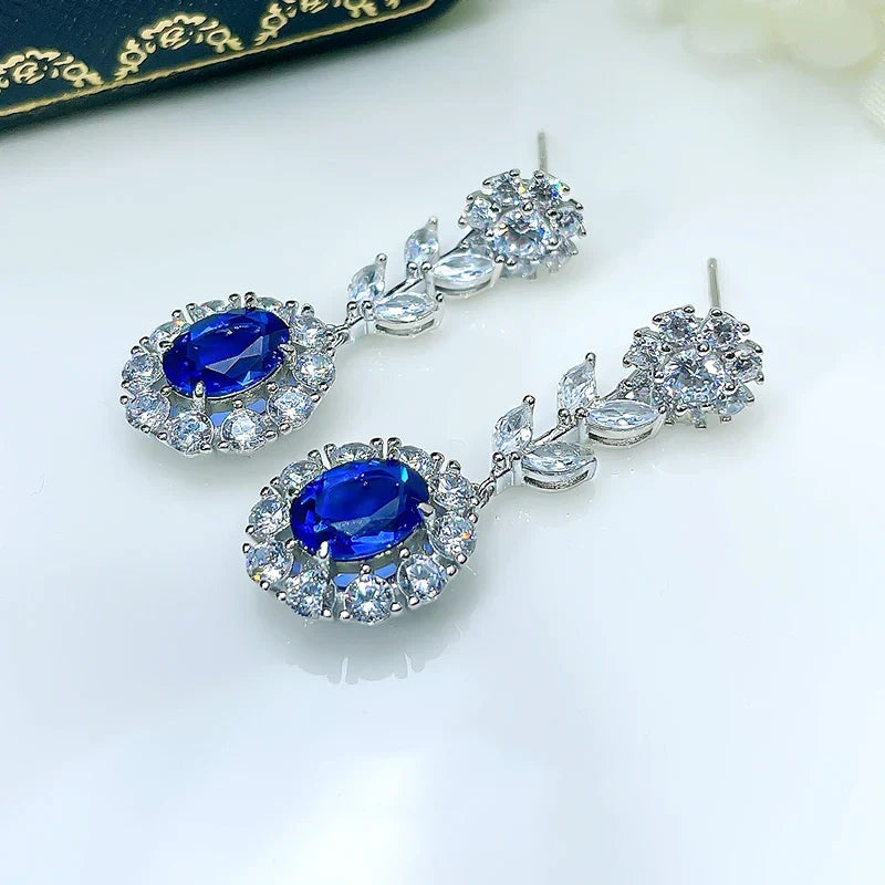 Huitan Flower Dangle Earrings – Blue & White CZ Silver Drop