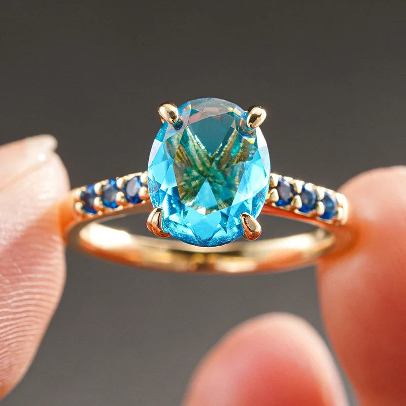 Huitan Sky Blue CZ Oval Ring – Gold Women's Wedding Band