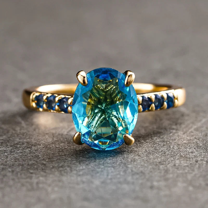 Huitan Sky Blue CZ Oval Ring – Gold Women's Wedding Band