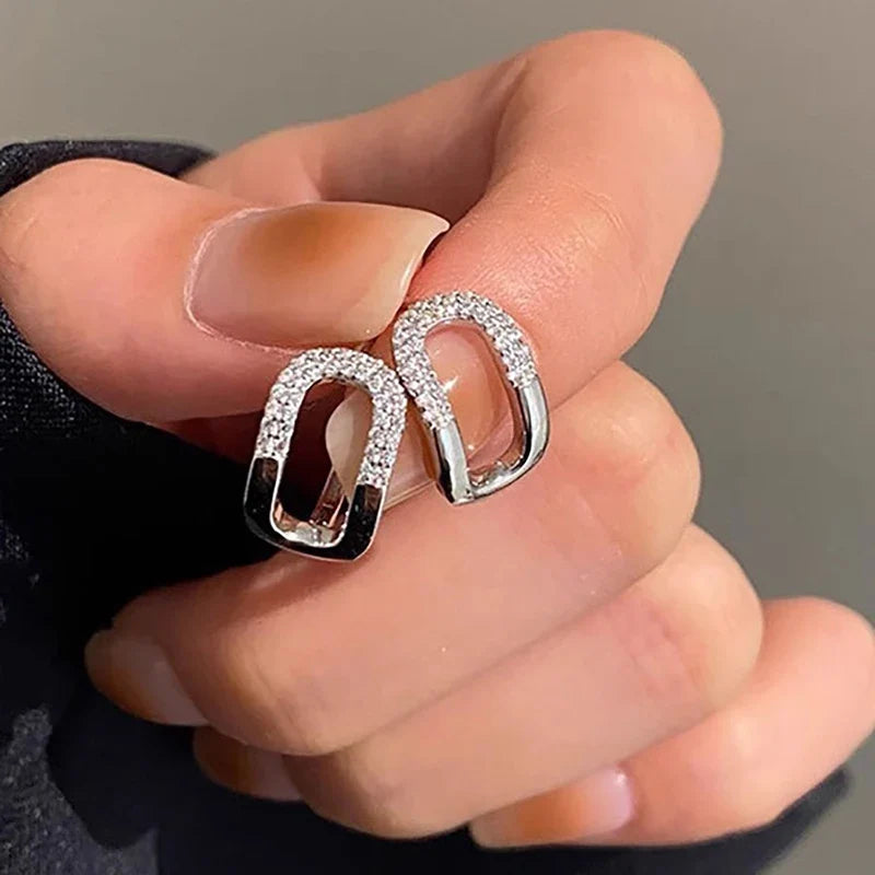 Huitan Curved Oval Hoop Earrings – Cubic Zirconia Fashion Jewelry