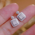 Huitan Geometric Pavé CZ Stud Earrings | Wedding & Party