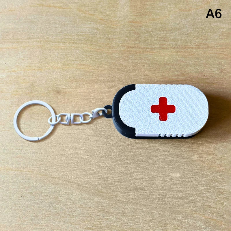Mini Sliding Pill Box Keychain – Multi-Compartment Travel Case