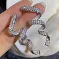 Huitan Ribbon CZ Drop Earrings – Sparkling Long Dangle