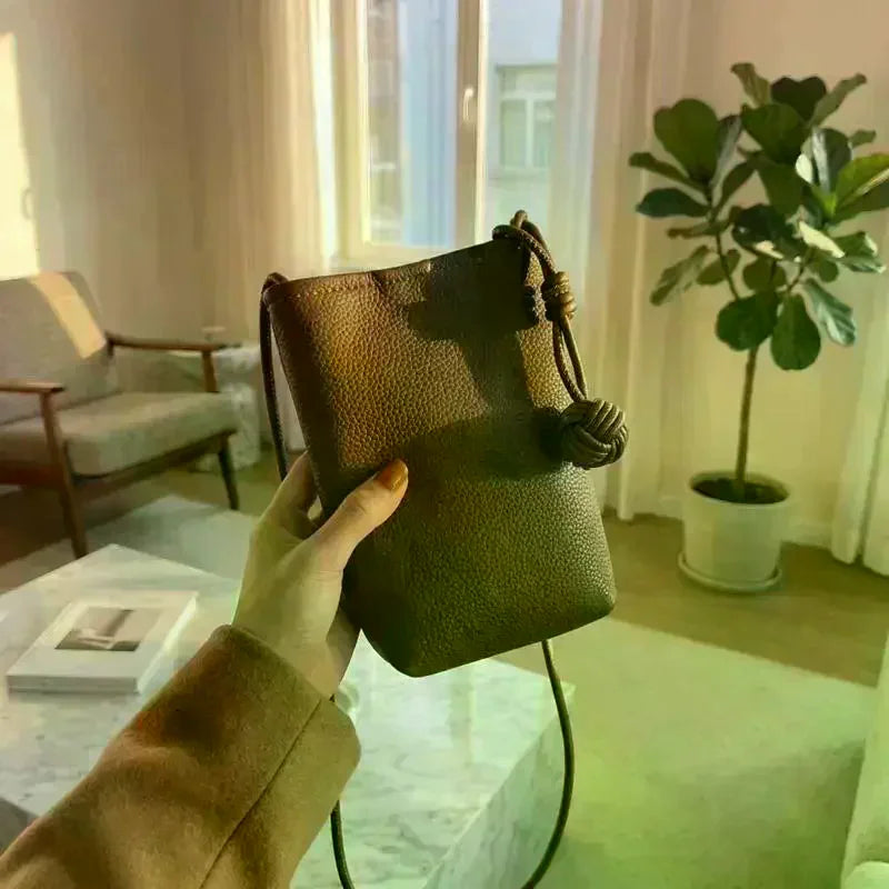 Women's Mini PU Leather Crossbody Phone Bag with Ball Pendant