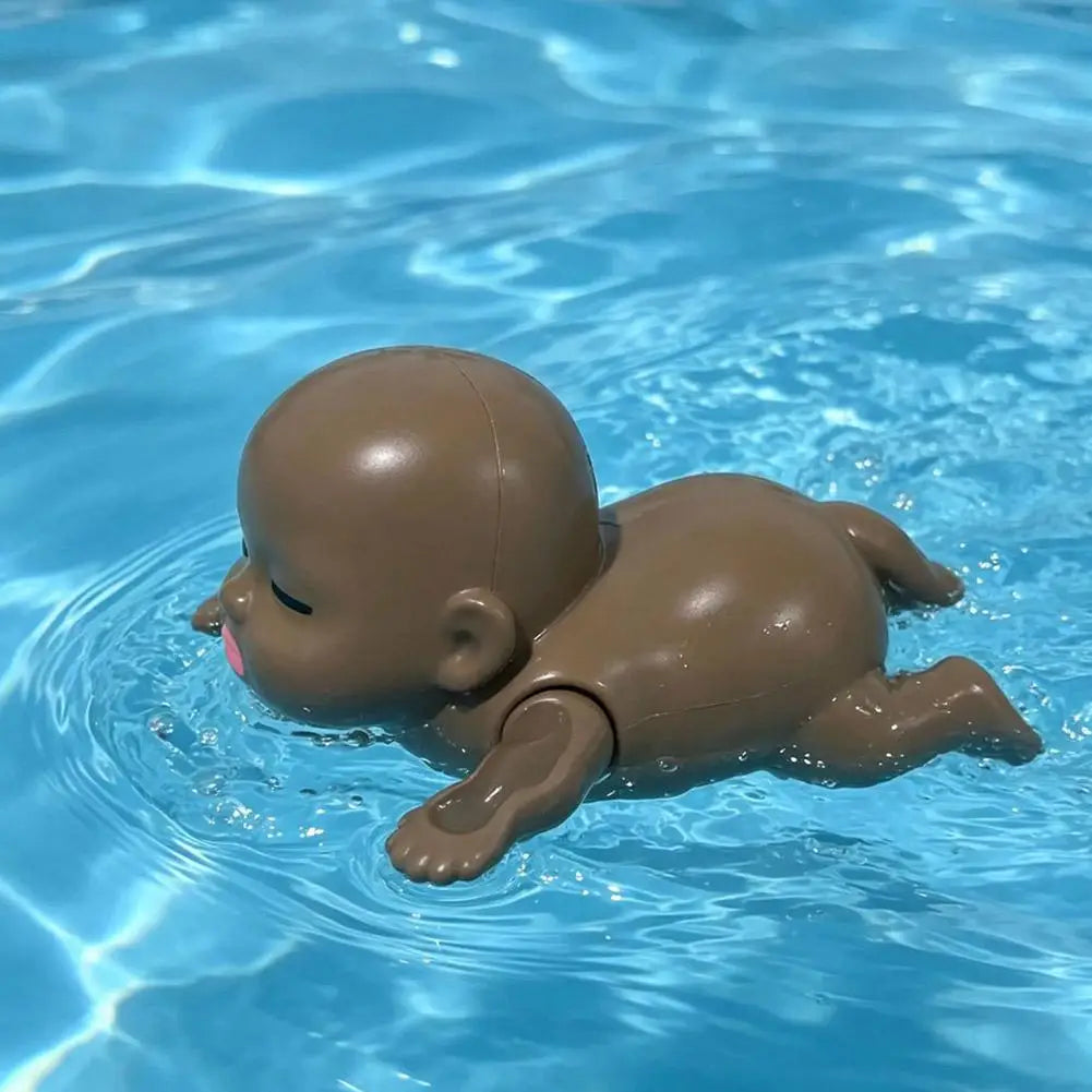 Plastic Wind Up Swimming Baby Doll Toy Realistic Floating Bathtub