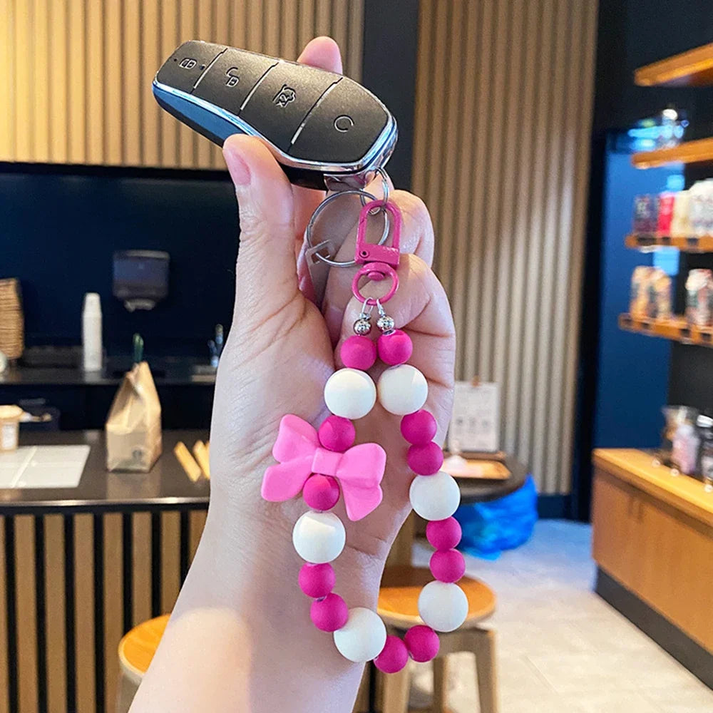 Pink Pearl Bow Keychain – Beaded Phone Charm & Bag Pendant