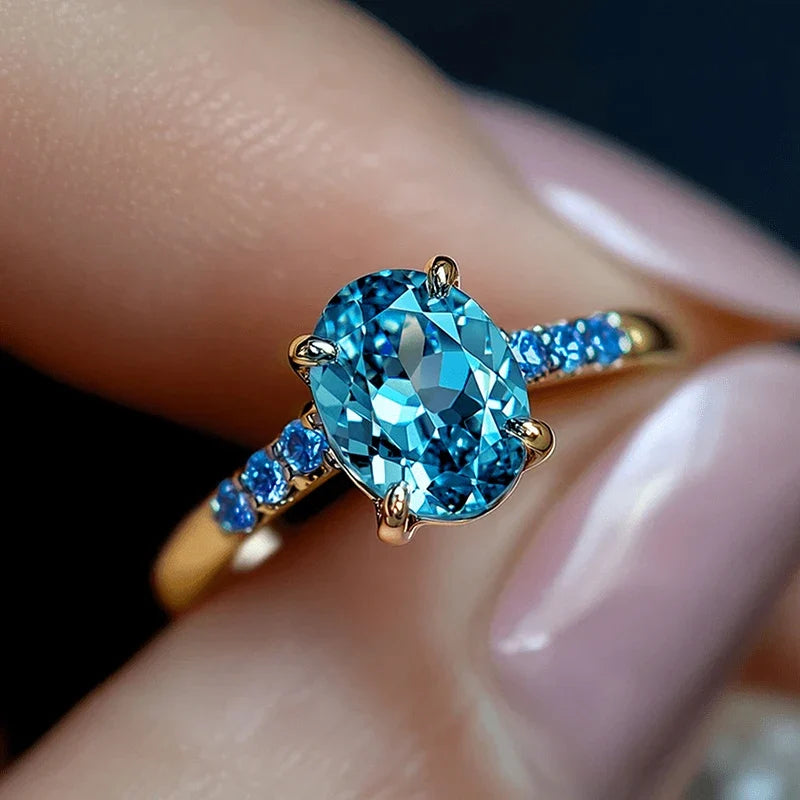 Huitan Sky Blue CZ Oval Ring – Gold Women's Wedding Band