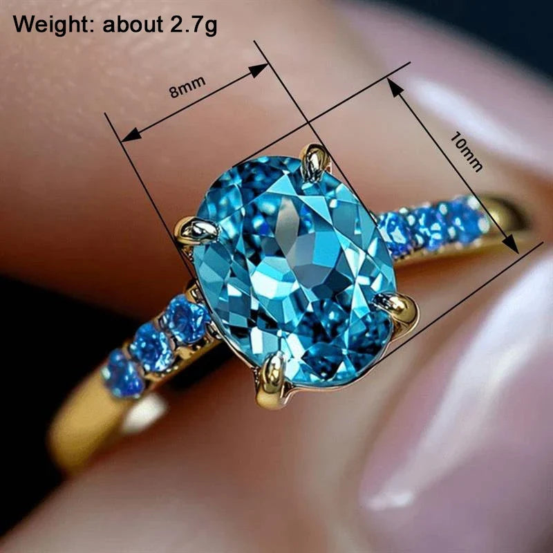 Huitan Sky Blue CZ Oval Ring – Gold Women's Wedding Band