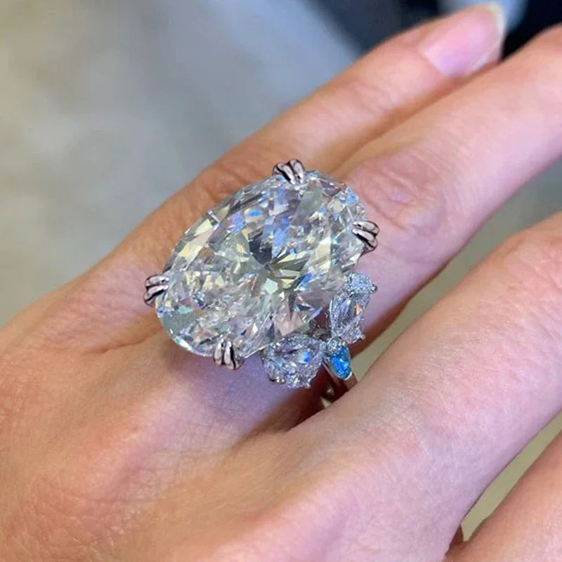 Huitan Oval CZ Butterfly Ring – Cocktail & Wedding Jewelry